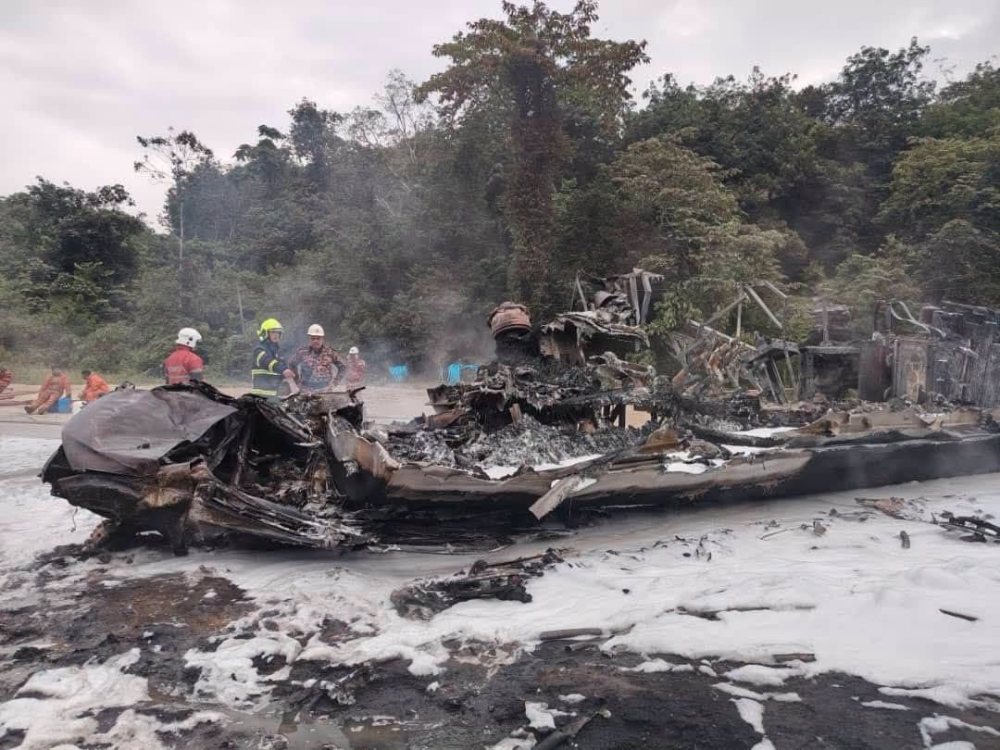 Police believe mother and son killed in Temerloh fuel tanker crash, DNA test underway