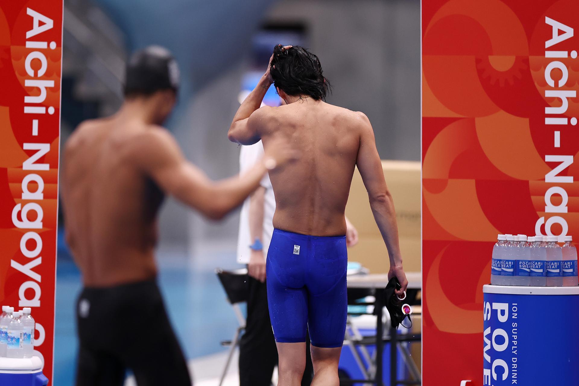 Injured swimmer pulls out of 2 races