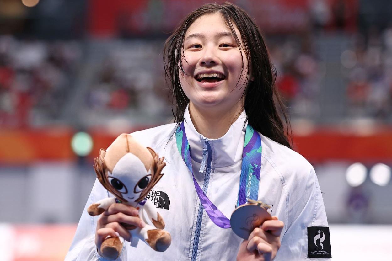 Kim Seung-won takes bronze in women's 100m backstroke