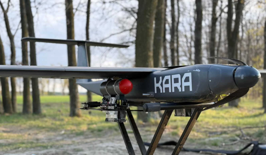 Ukraine’s new drone ferries FPV drones deep behind Russian lines and releases them there. It costs about $9,900 and does three other jobs too