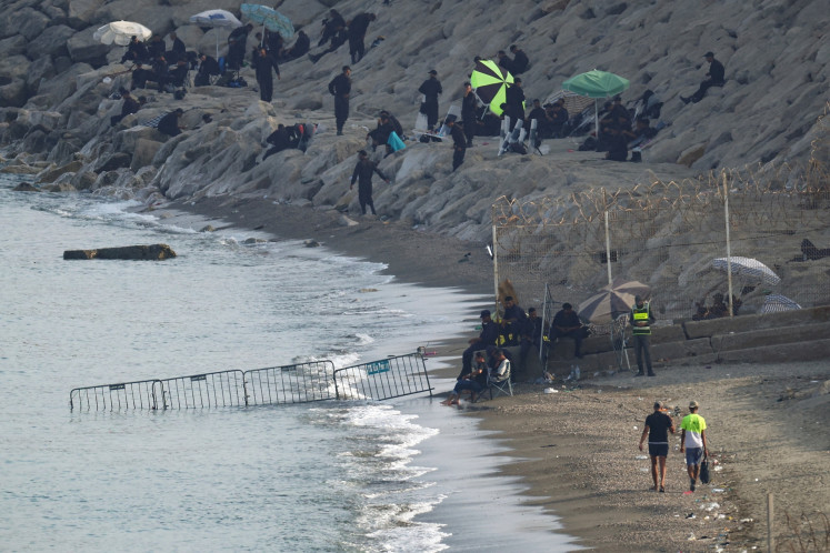 Spain boosts security in Ceuta as calls appear online for another mass border ru...