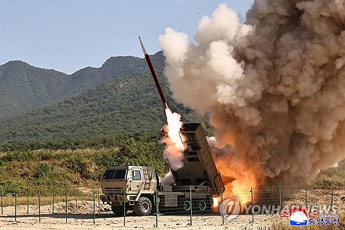 N. Korea test-fires upgraded multiple-rocket launcher shells
