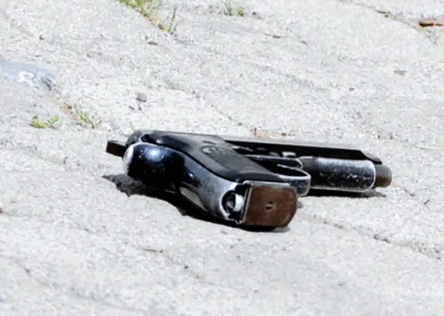 Police probe how security company firearm ended up with arrested man