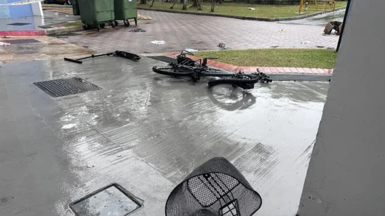 Police arrest man after six-hour standoff at Bukit Batok block where bicycle and other items were thrown