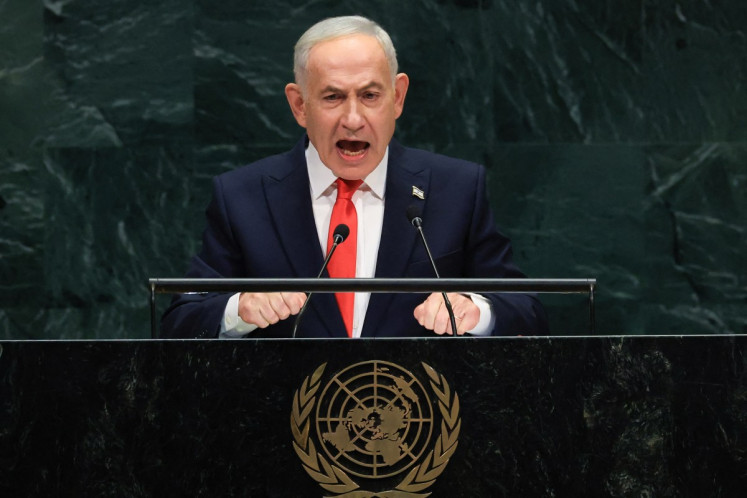 Delegates walk out as Netanyahu defends Israel at UN