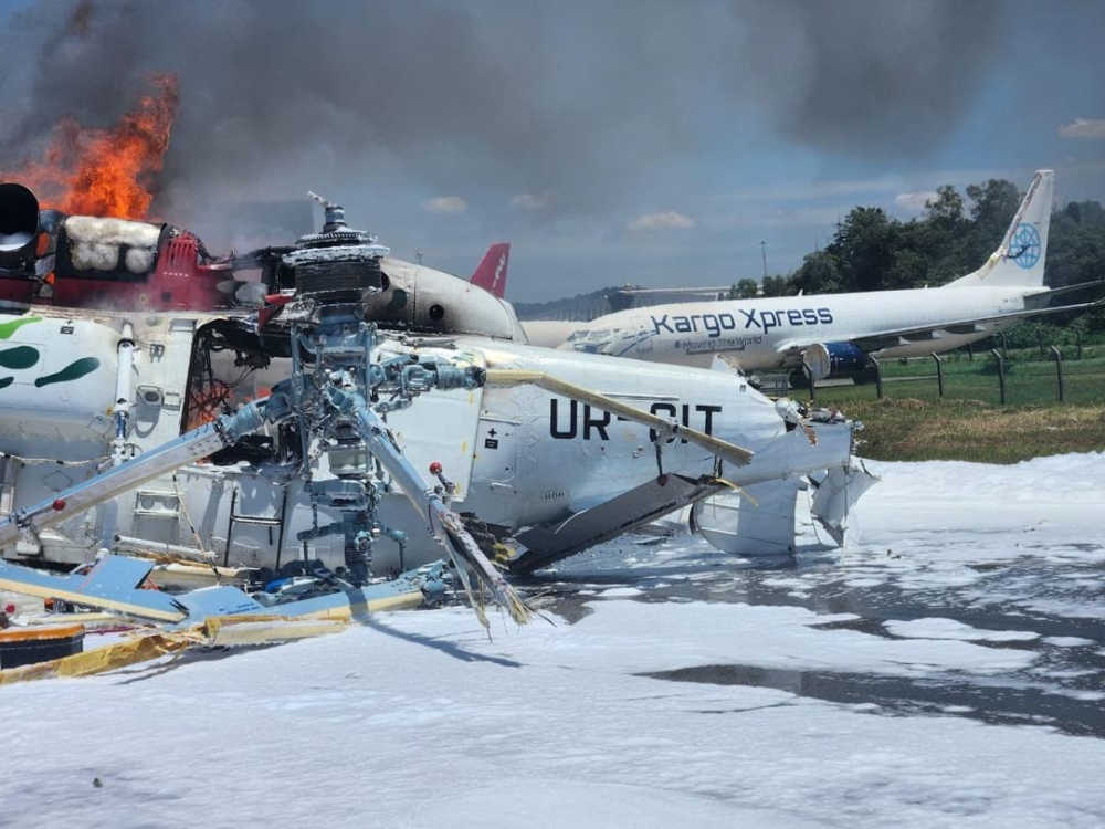 Helicopter catches fire during engine test at Subang airport, four escape but one hit by debris