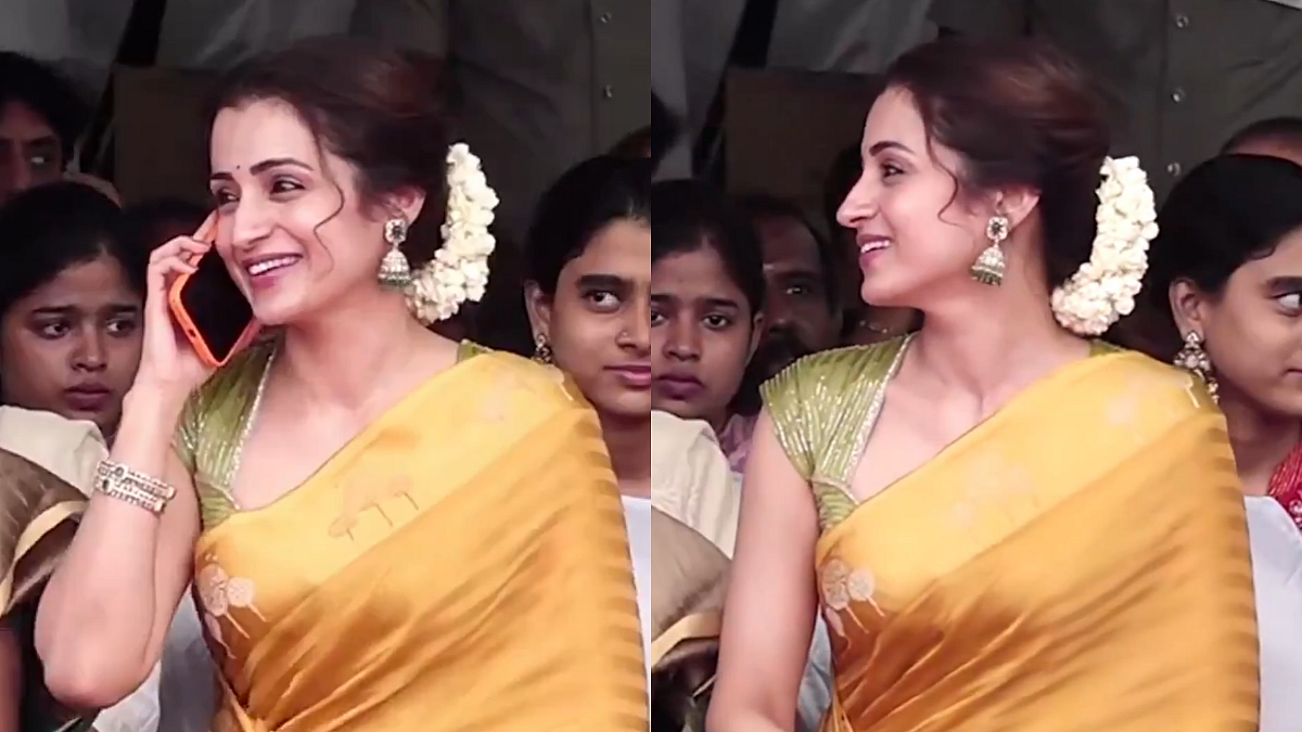Trisha Krishnan Joins Tamil Nadu CM Vijay At Independence Day Event In Stunning Saffron Saree; Unknowingly Creates Tri-colour Formation With His Parents | WATCH