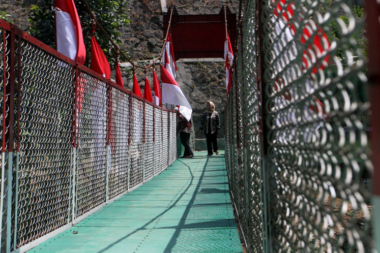 Militarism concern raised after Prabowo inaugurates bridges built by TNI, police