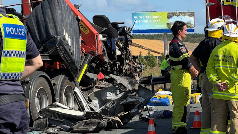 Bruce Highway closed, delayed after two trucks crash, driver airlifted to hospital