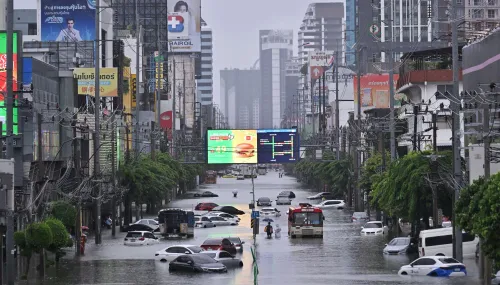 Bangkok declares flood disaster as torrential rain leaves streets submerged