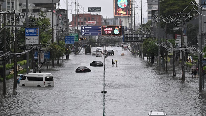 Canals full, roads submerged as Bangkok declares flood disaster