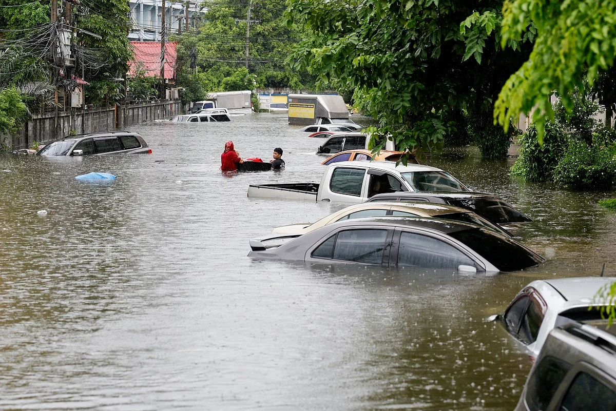 Canals full, roads submerged as Bangkok declares flood disaster