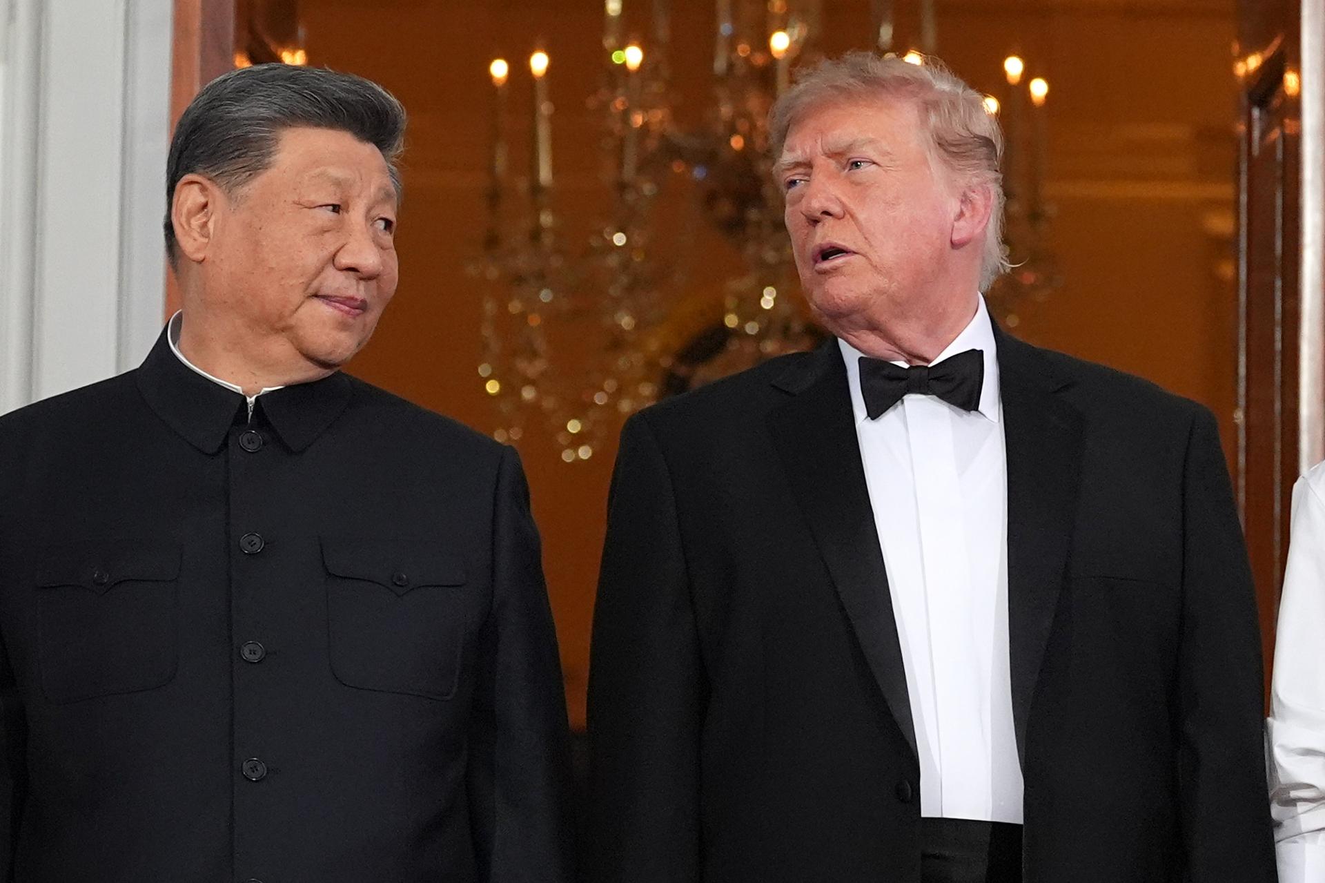 Trump, Xi agree to establish AI communication channel, oppose tolls on int'l waterways: White House