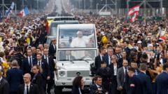 Huge crowds greet Pope in Paris for open-air Mass